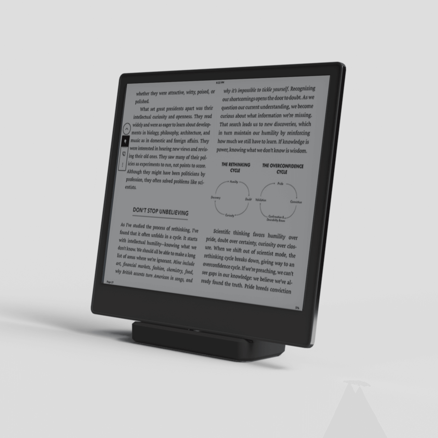 UniDokr universal charger dock with Kindle e-reader displaying text, showcasing versatile charging for Scribe, Oasis, and Paperwhite.